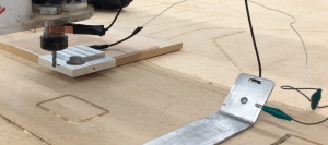 The cable connects the XYZ plate to the Z plate that comes with the Shopbot for finding the Z axis.