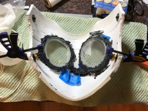 Sealing the acrylic eyes in with silicone